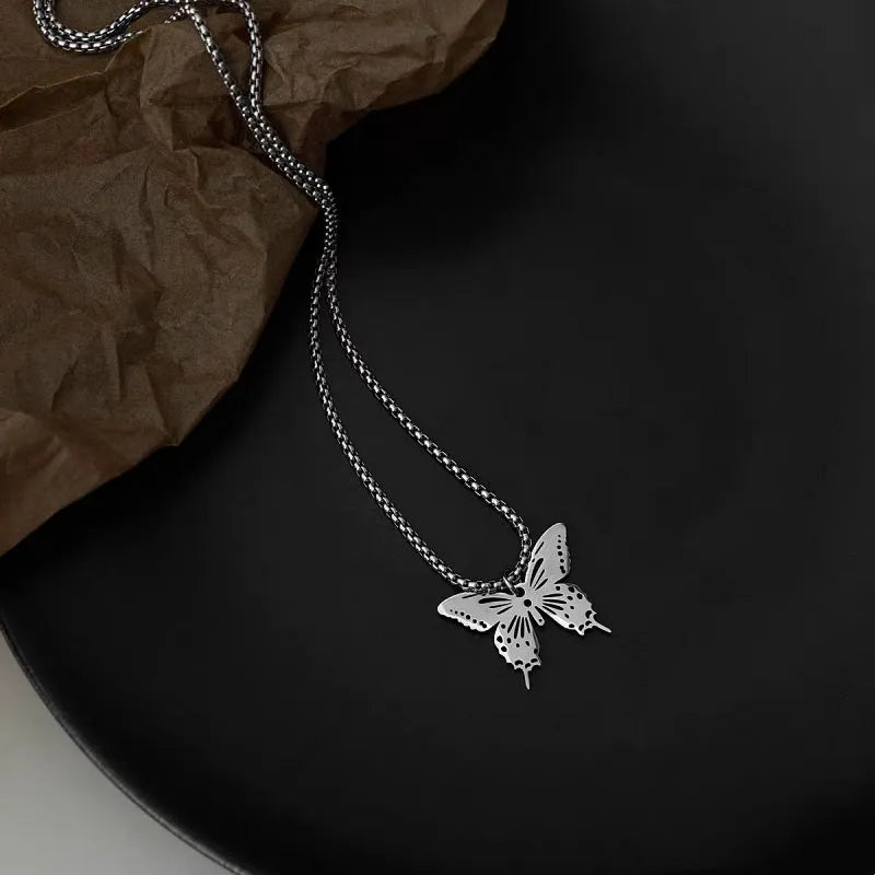 Close-up of the pendant and clasp on the Hollow Butterfly Necklace