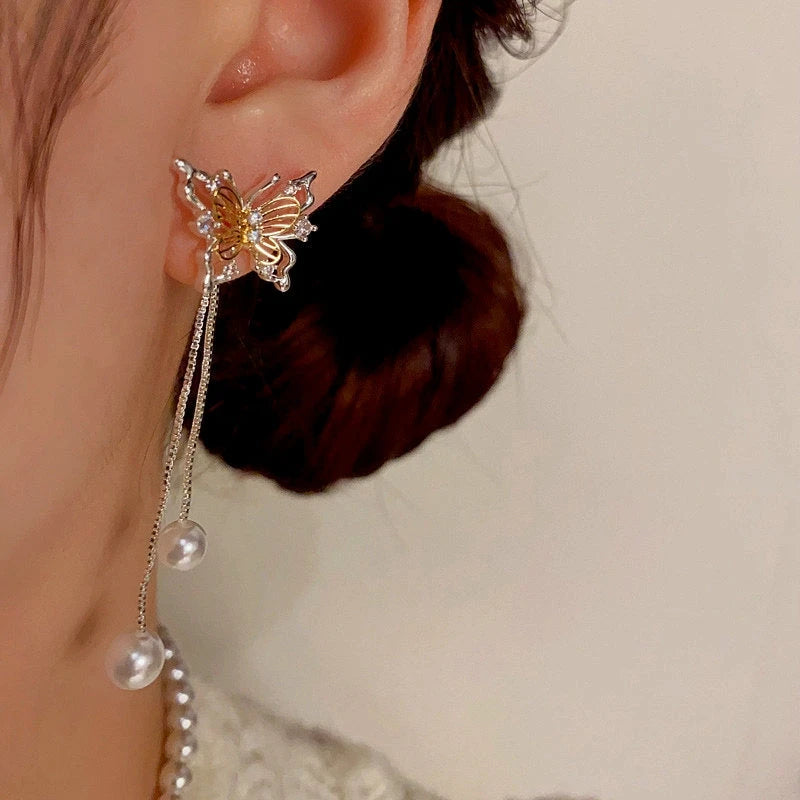 Close-up detail of the sparkling zircons and plating on the Butterfly Pearl Tassel