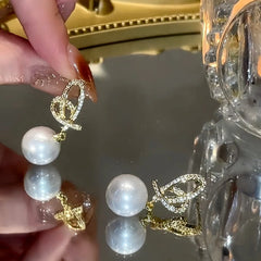 Close-up detail of the sparkling zircons and plating on the Hollow Heart Pearl