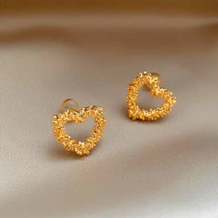 Close-up detail of the sparkling zircons and plating on the Hollow Heart Studs