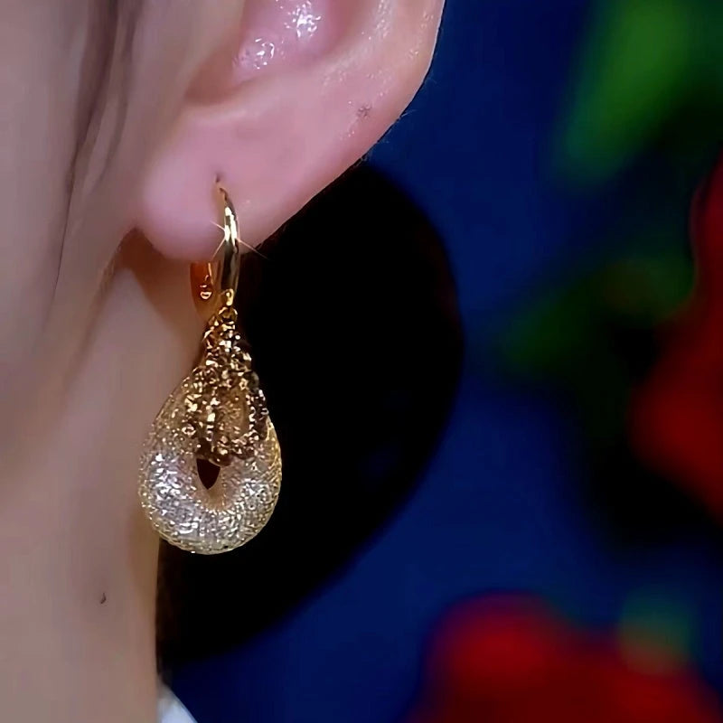 Close-up detail of the sparkling zircons and plating on the Mesh Water Drop