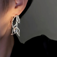Model showcasing the dangle and style of the 14K Gold-Plated Hollow Tulip Earrings
