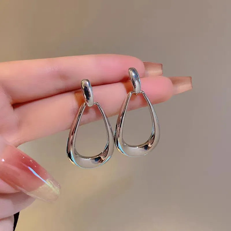 Close-up detail of the sparkling zircons and plating on the Hollow Water Drop