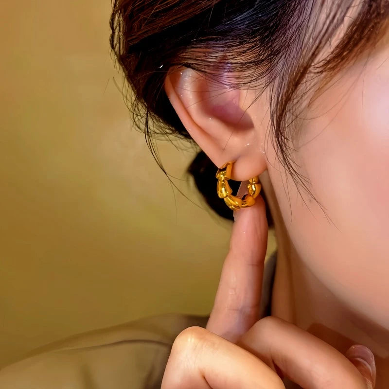 Close-up detail of the sparkling zircons and plating on the Chunky Hoop Earrings