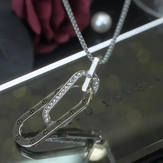 14K Gold-Plated Interlocking Necklace worn to showcase its length and pendant detail