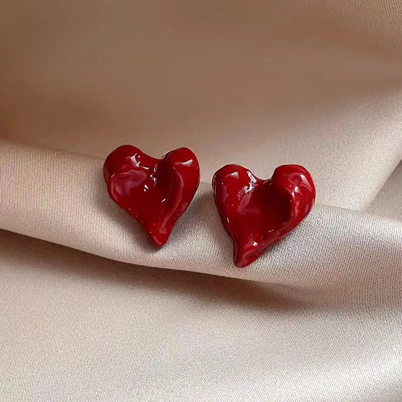 Angled view of the 14K Gold-Plated Irregular Heart Stud Earrings