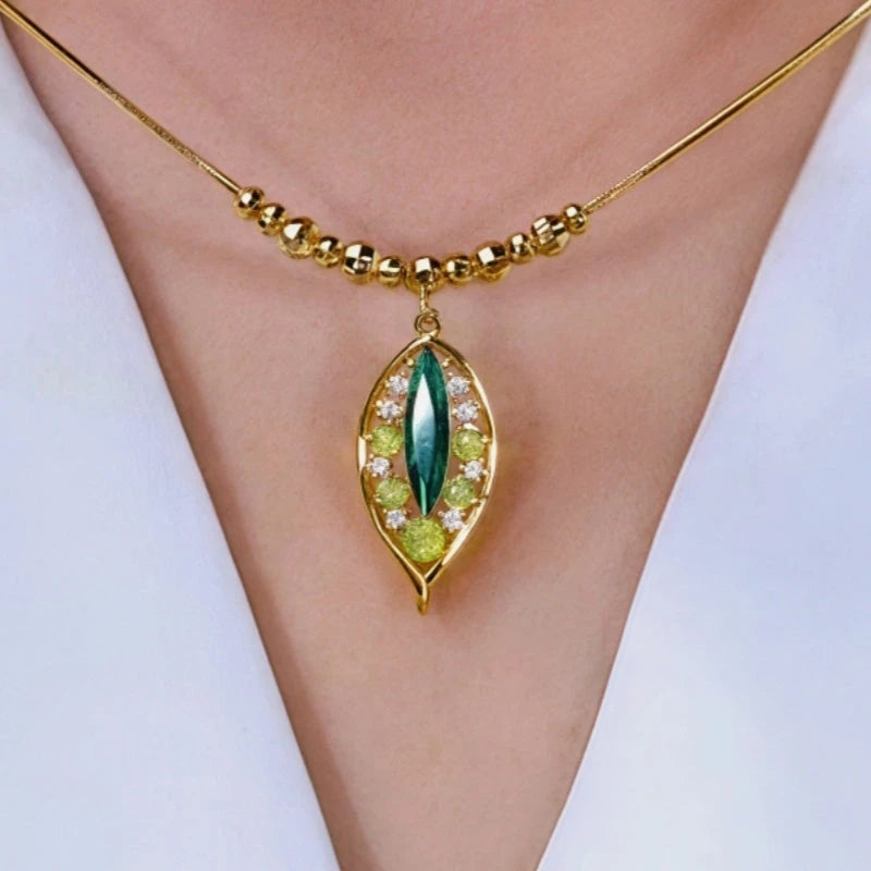 14K Gold-Plated Jade Leaf Necklace worn to showcase its length and pendant detail