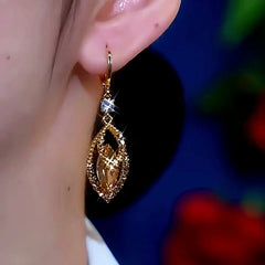 Close-up detail of the sparkling zircons and plating on the Jade Zircon Earrings