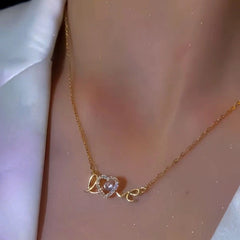 Close-up of the pendant and clasp on the LOVE Block Necklace