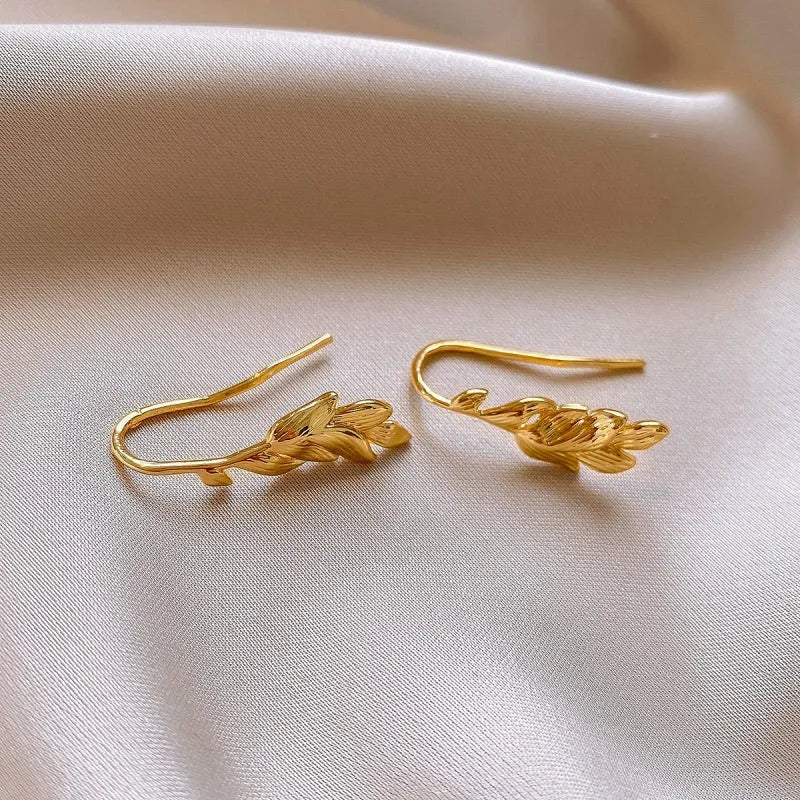 Angled view of the 14K Gold-Plated Leaf Ear Hooks