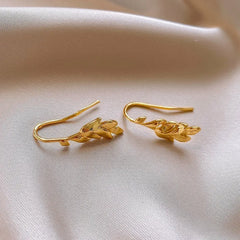 Angled view of the 14K Gold-Plated Leaf Ear Hooks
