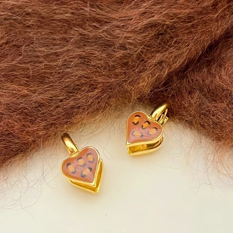 Close-up detail of the sparkling zircons and plating on the Leopard Heart Jackets