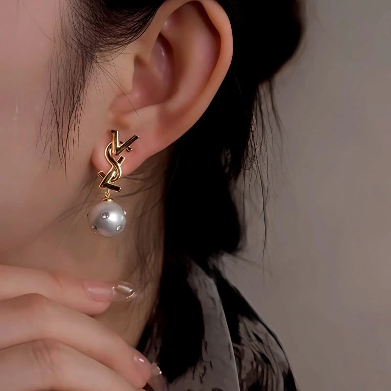 Close-up detail of the sparkling zircons and plating on the Personalized Pearl Earrings