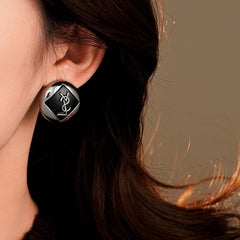 Close-up detail of the sparkling zircons and plating on the Initial Letter Studs