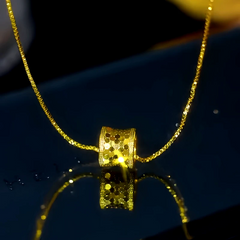 Close-up of the pendant and clasp on the Hourglass Necklace