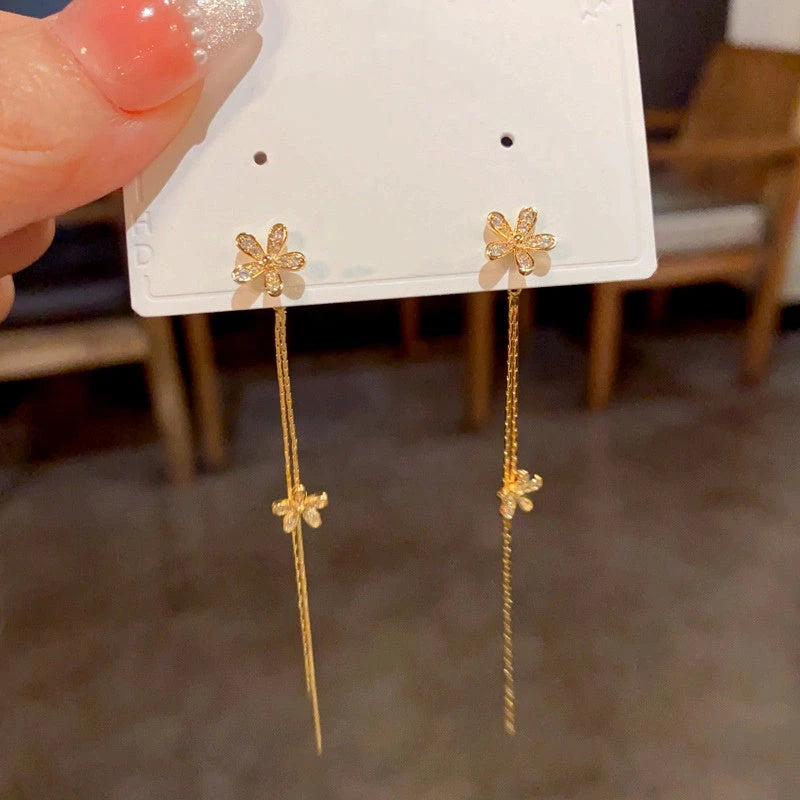 Close-up detail of the sparkling zircons and plating on the Flower Tassel Earrings