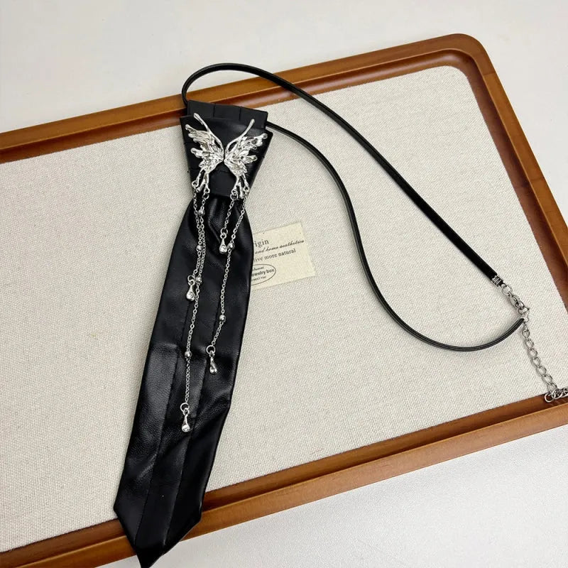 Close-up of the pendant and clasp on the Butterfly Tie Necklace