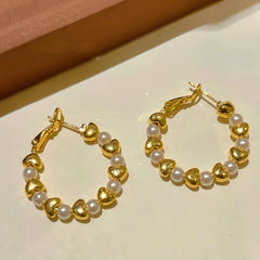 Angled view of the 14K Gold-Plated Love Bead Hoop Earrings