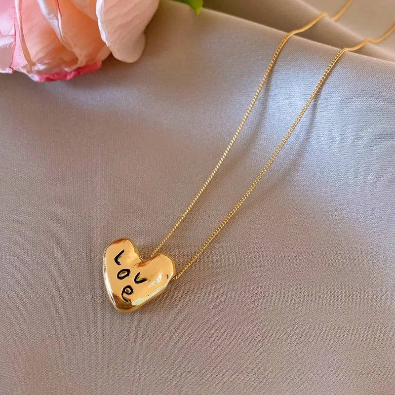 Detailed view of the 14K Gold-Plated Love Letter Heart Necklace chain and pendant