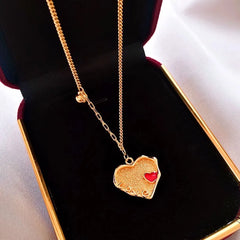 Detailed view of the 14K Gold-Plated Love Letter Little Red Heart Pendant Heart Necklace chain and pendant