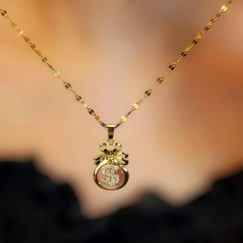 14K Gold-Plated Lucky Diamond Dollar Bag Necklaces worn to showcase its length and pendant detail
