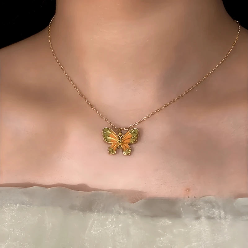 14K Gold-Plated Luminous Butterfly Necklace worn to showcase its length and pendant detail