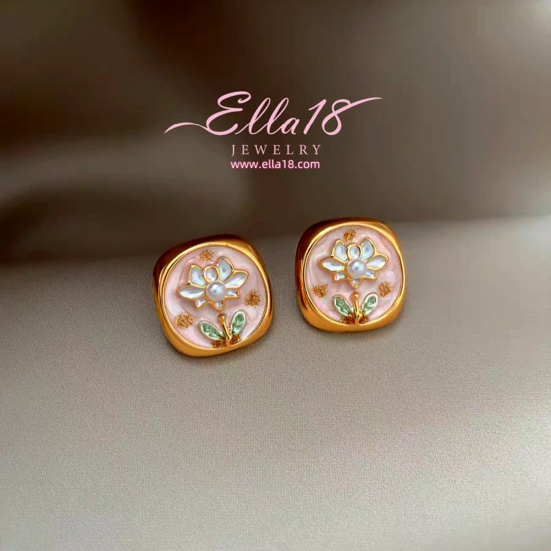 Model showcasing the dangle and style of the 14K Gold-Plated Luxury Baroque Pearl Stud Earrings
