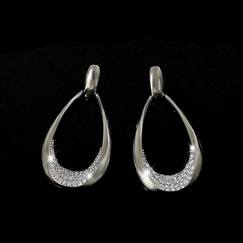 Angled view of the 14K Gold-Plated Luxury Big Water Drop Earrings