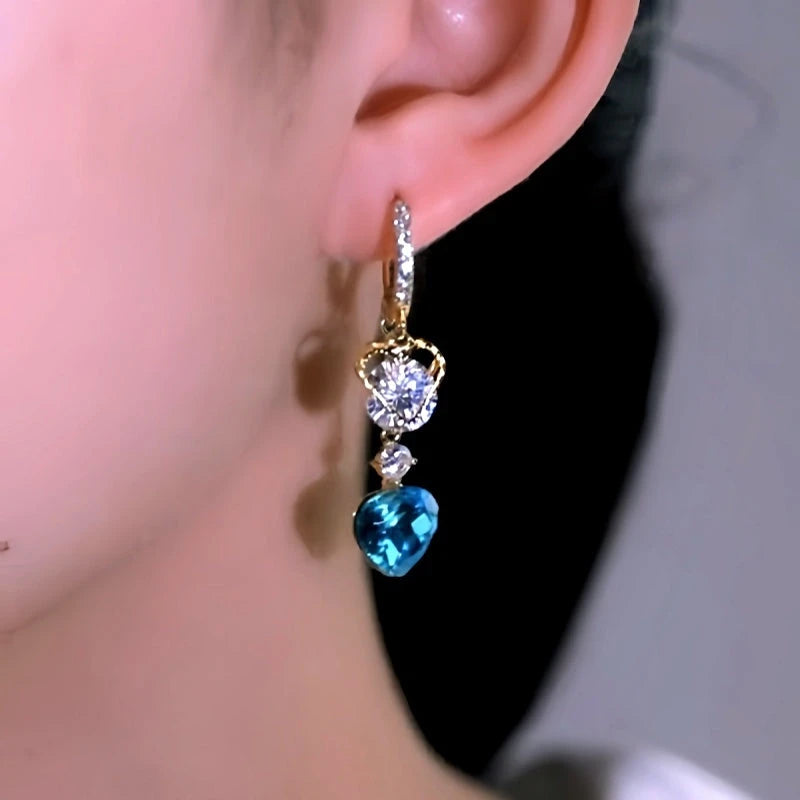 Close-up detail of the sparkling zircons and plating on the Blue Heart Tassel