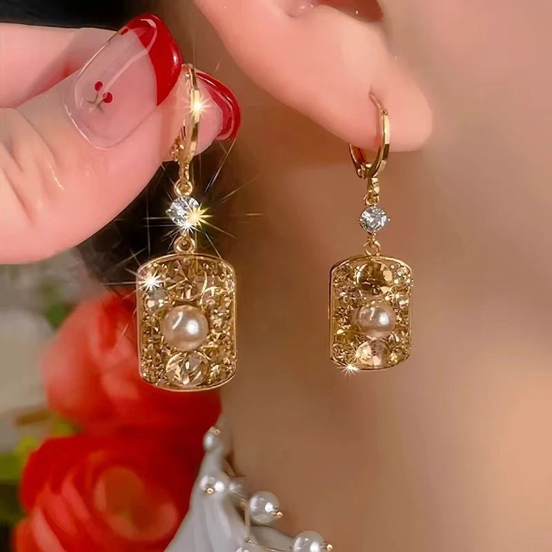 Close-up detail of the sparkling zircons and plating on the Floral Pearl Earrings