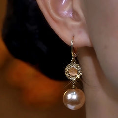 Close-up detail of the sparkling zircons and plating on the Cat's Eye Pearl