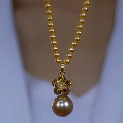 14K Gold-Plated Luxury Brown Zircon Pearl Necklace worn to showcase its length and pendant detail