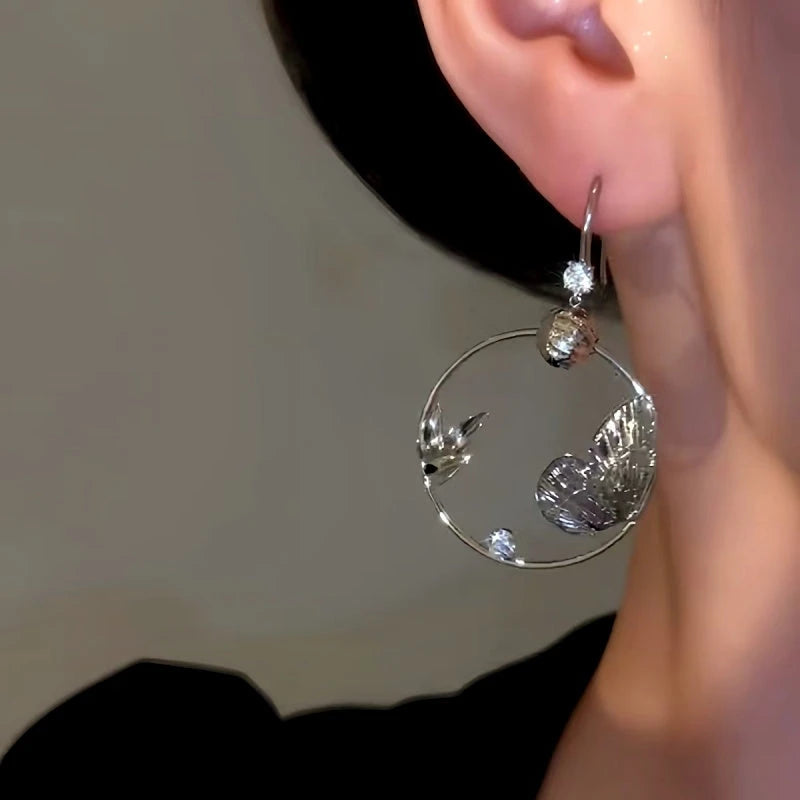 Close-up detail of the sparkling zircons and plating on the Pave Butterfly Hooks