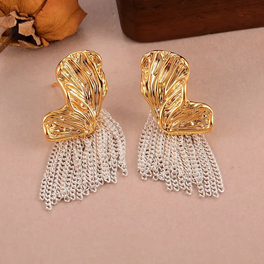 Model showcasing the dangle and style of the 14K Gold-Plated Luxury Butterfly Tassel Earrings