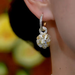 Close-up detail of the sparkling zircons and plating on the Cat's Eye Drops