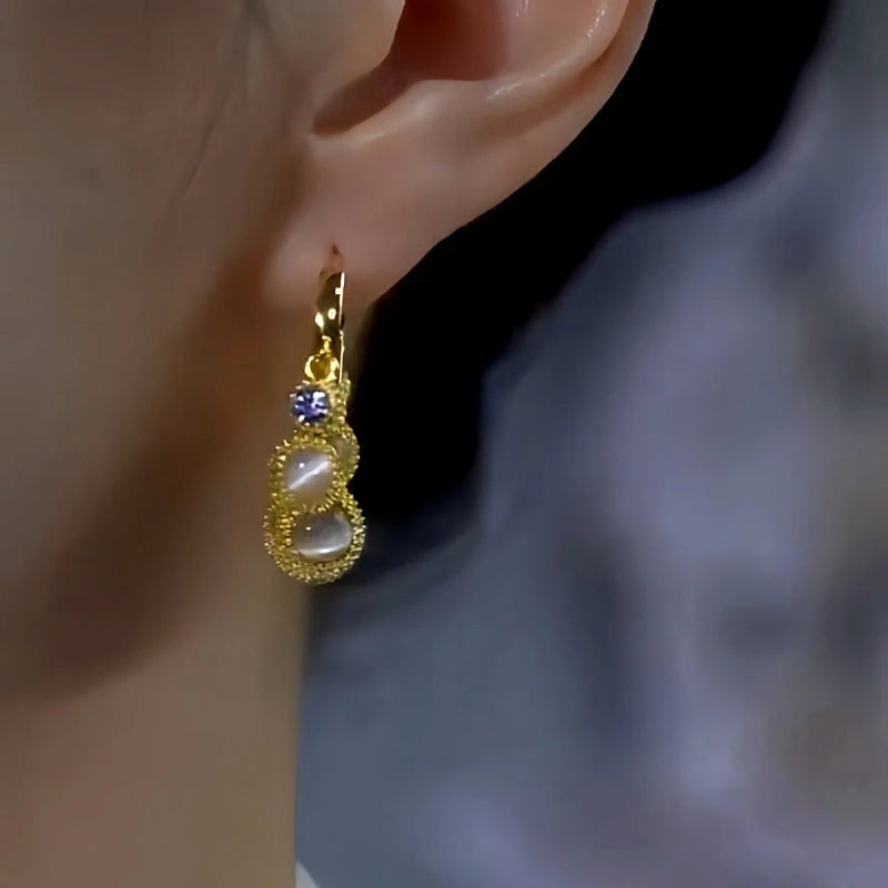 Close-up detail of the sparkling zircons and plating on the Cat's Eye Spiked Ball