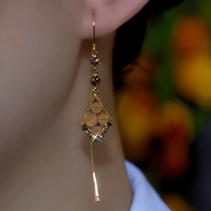 Close-up detail of the sparkling zircons and plating on the Cat's Eye Threaders