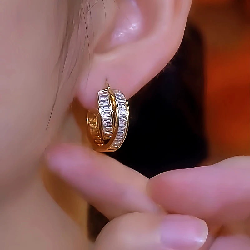 Close-up detail of the sparkling zircons and plating on the Geometric Hoop Earrings