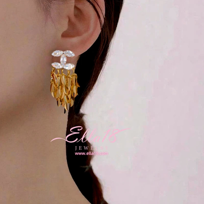 Close-up detail of the sparkling zircons and plating on the Leaf Tassel Earrings
