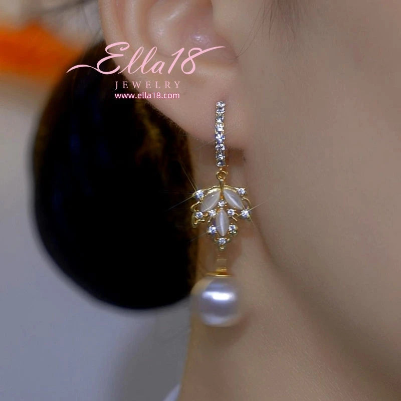 Close-up detail of the sparkling zircons and plating on the Cat's Eye Earrings