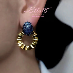 Close-up detail of the sparkling zircons and plating on the Blue Zircon Earrings