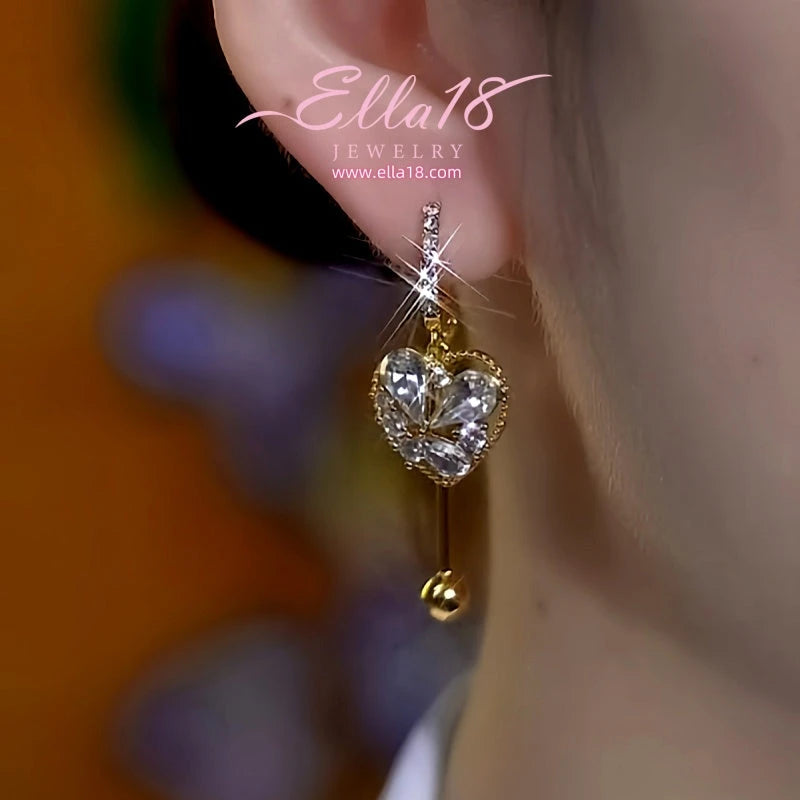 Close-up detail of the sparkling zircons and plating on the Heart Tassel Earrings