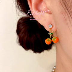 Close-up detail of the sparkling zircons and plating on the Persimmon Fruit Earrings