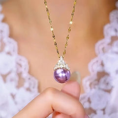 Close-up of the pendant and clasp on the Purple Pearl Necklaces