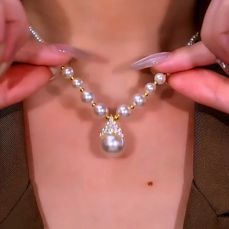 Detailed view of the 14K Gold-Plated Luxury Diamond Pearl Necklaces chain and pendant