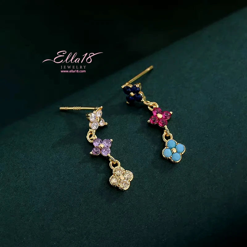 Close-up detail of the sparkling zircons and plating on the Clover Tassel Earrings