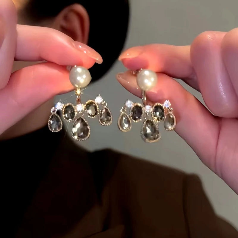 Close-up detail of the sparkling zircons and plating on the Crystal Tassel Earrings