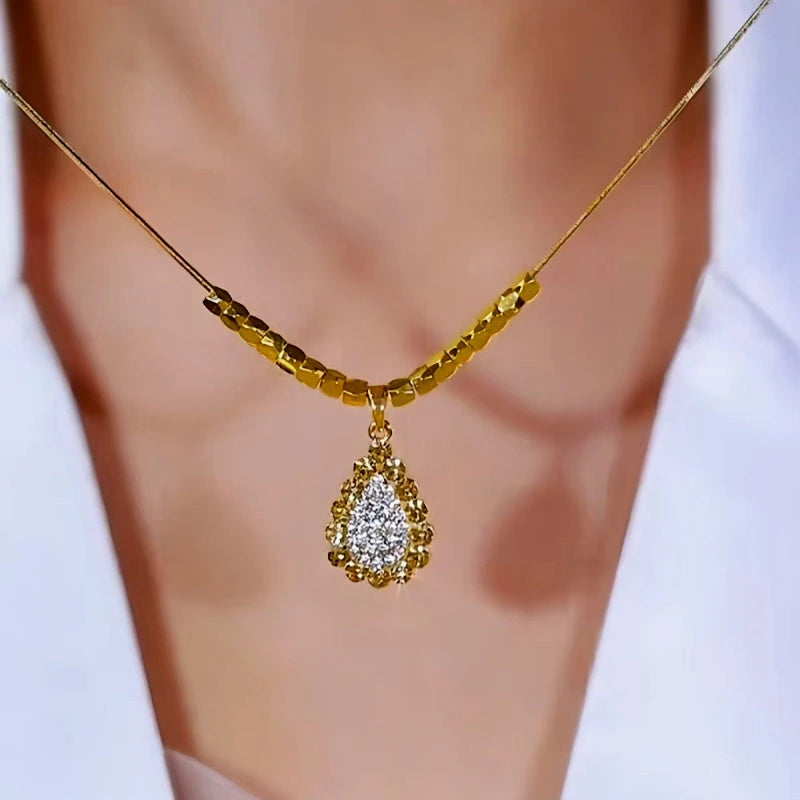 14K Gold-Plated Luxury Full Diamond Water Drop Necklace worn to showcase its length and pendant detail