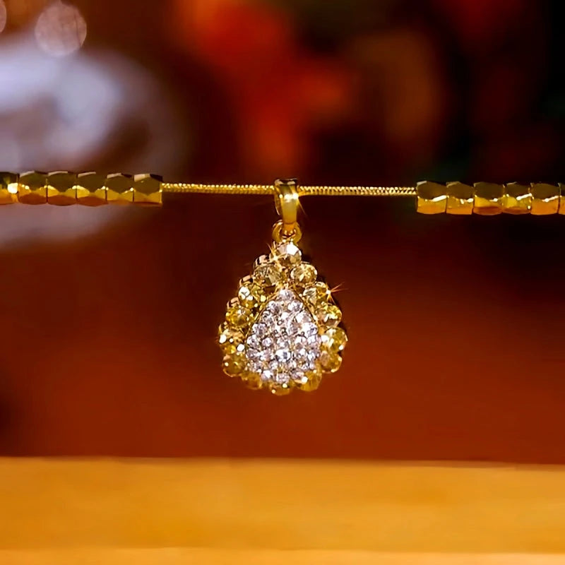 Detailed view of the 14K Gold-Plated Luxury Full Diamond Water Drop Necklace chain and pendant