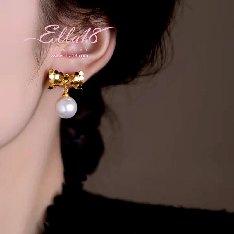 Close-up detail of the sparkling zircons and plating on the Bow Pearl Earrings